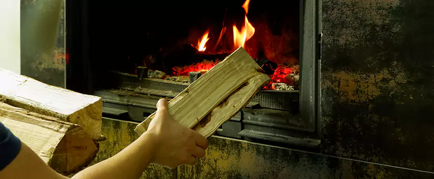 Wood Stove Heat Resistant Wall Repair in Saanich, British Columbia